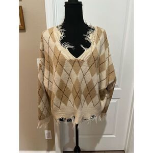 Just Polly New York tan and cream argyle sweater with distressed details